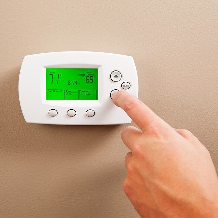 upgrade your thermostat to save money on utility bills